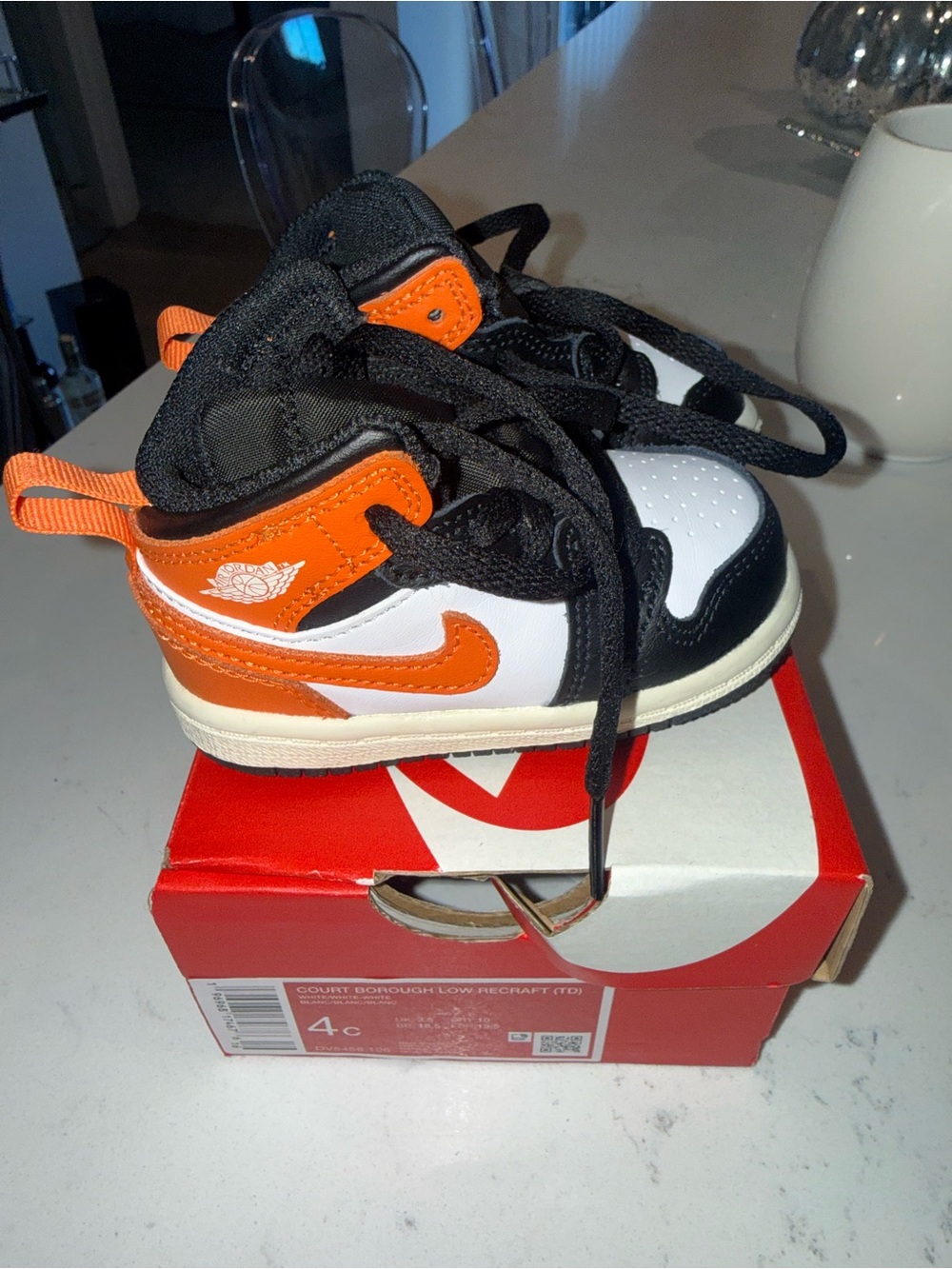 Nike toddler 4C Orange, Black & White High-Top Sneakers